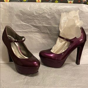 WORN ONCE Guess shiny purple platform heels. W 9.